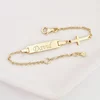 Bratara bebe - Placuta cu nume - Simbol cruciulita si lantisor - Argint 925 placat cu Aur Galben 18K