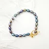 Bratara cu Perle - model sirag de perle rice peacock de apa dulce - Argint 925 placat cu Aur Galben 18K