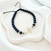 Bratara cu pietre Onix - Model Cruce cu Diamant Negru si Bilute - Argint 925 placat cu Aur galben 18K- Snur reglabil