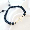 Bratara cu pietre Onix - Model Cruce cu Diamant Negru si Bilute - Argint 925 placat cu Aur galben 18K- Snur reglabil