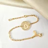 Bratara personalizata - Banut cu initiala si simbol coronita - 12 mm - Argint 925 placat cu Aur Galben 18K - Cu lantisor fata/baiat