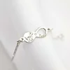 Brățară personalizata cu simbolul infinitului,dinozaur și nume – Diamant natural - Argint 925 Rodiat - Cu lantisor fata/baiat