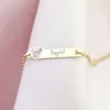 Bratara placuta - Forma soricel cu fundita gravat cu nume personalizat - Argint 925 placat cu Aur Galben 18K - Cu lantisor fata/baiat