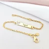 Bratara placuta - Forma soricel cu fundita gravat cu nume personalizat - Argint 925 placat cu Aur Galben 18K - Cu lantisor fata/baiat