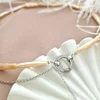 Lantisor cu Perle - Gratie de flamingo - Model sirag perle stick peachi conectate cu un charm cu Zirconii si un lant cu pandantiv - Argint 925