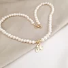 Lantisor cu Perle - Initiala eleganta - Model sirag de perle si si 4 bilute - Argint placat cu Aur Galben 18K