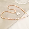 Lantisor cu Perle - Misterul petalelor - Model sirag perle rice peach si pandantiv floare cu Rubin - Argint 925