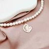 Lantisor Perlele Iubirii Materne - Model cu lant zale dreptunghiulare, pandantiv inima si perle - Argint 925 placat cu Aur roz 18K