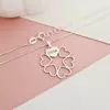 Lantisor personalizat - O stea intre inimi -  Gravura 1 nume - Argint 925