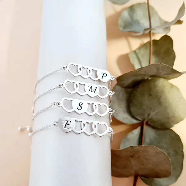 Set 4 bratari - 4 inimi decupate intrepatrunse - Argint 925