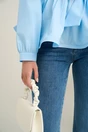 Blugi casual din denim albastri evazati cu decupaj la baza