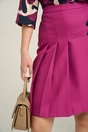 Fusta office din stofa fucsia cu catarame si pliuri