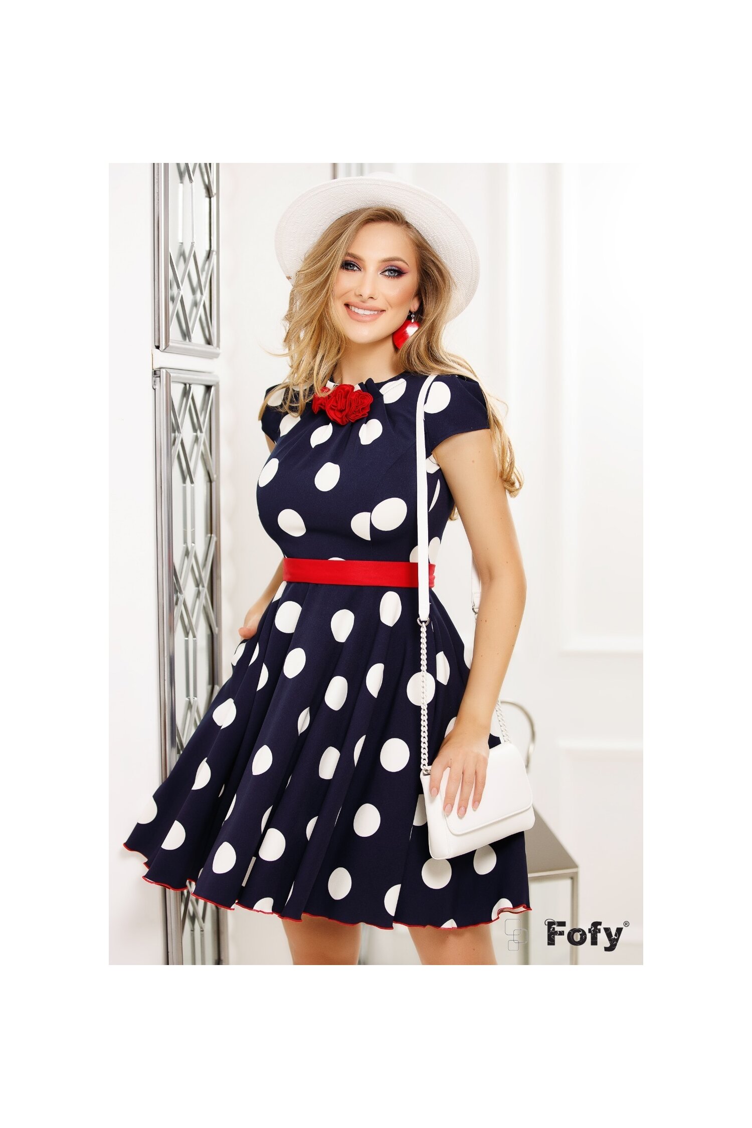 Rochie Fofy bleumarin cu buline maxi albe si aplicatii florale la baza gatului