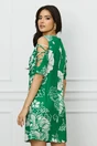 Rochie de zi verde cu imprimeuri albe si decupaje pe maneci