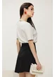 Fusta eleganta Fofy mini din tweed premium negru cu fundite strassuri