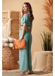 Salopeta de vara turcoaz decoltata cu pantalon lejer si centura boho