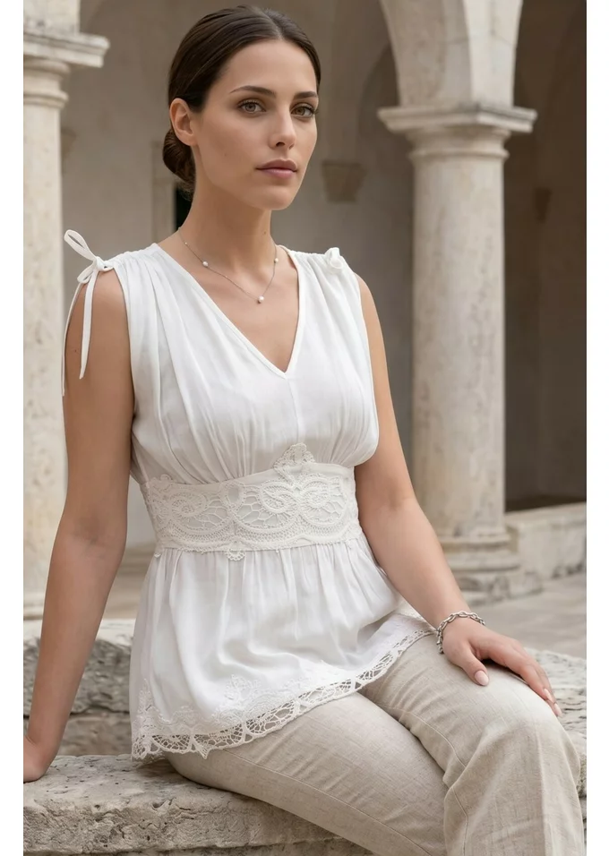 Bluza de vara alba cu peplum accesorizata cu boderie