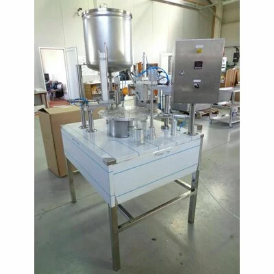 Masina pentru ambalat miere la caserola semiautomata picture - 2