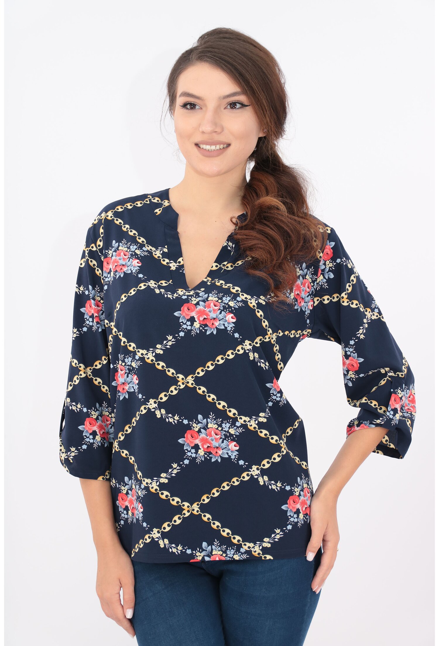 Bluza bleumarin cu model floral si guler tunica