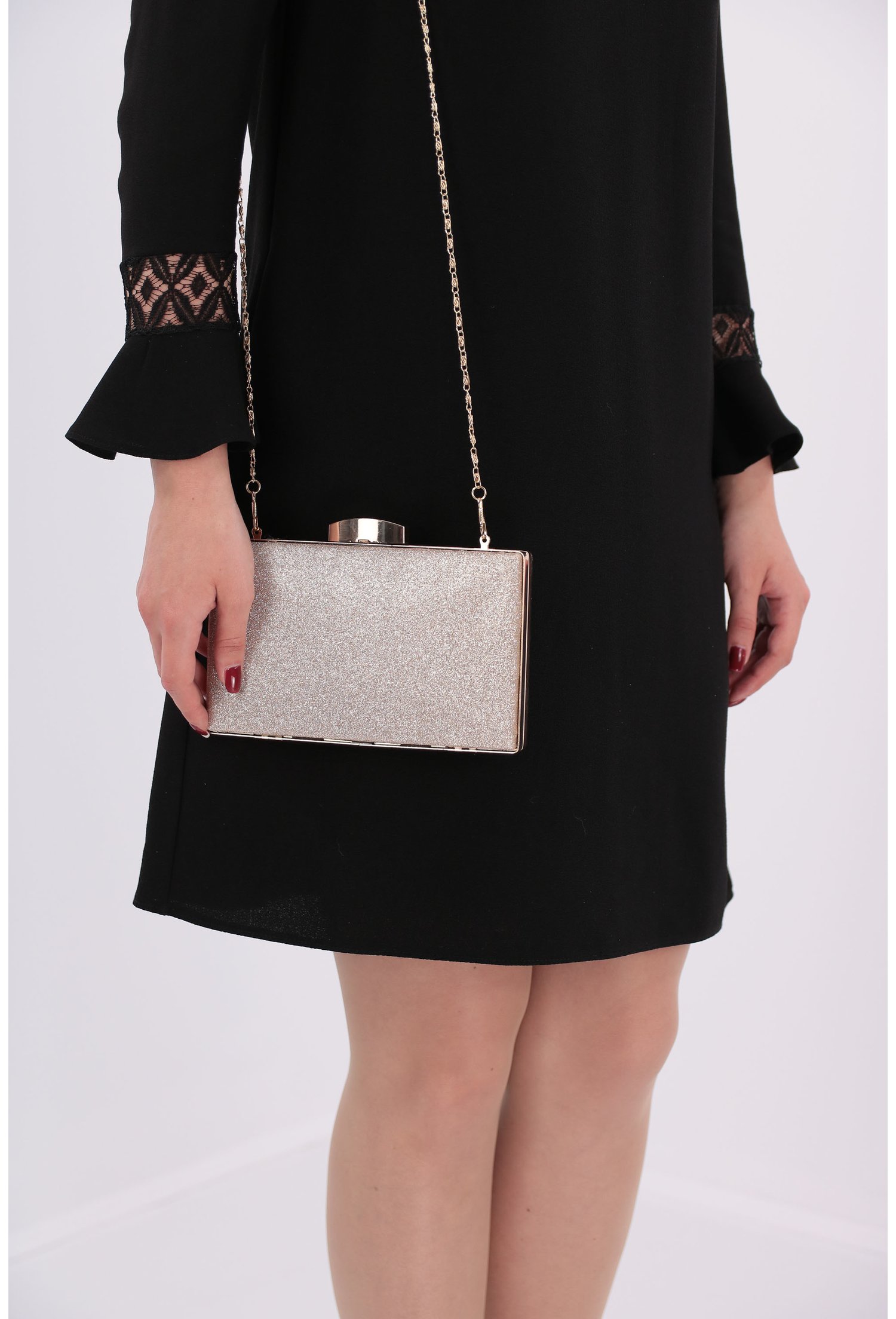 Clutch auriu din material textil tip lurex