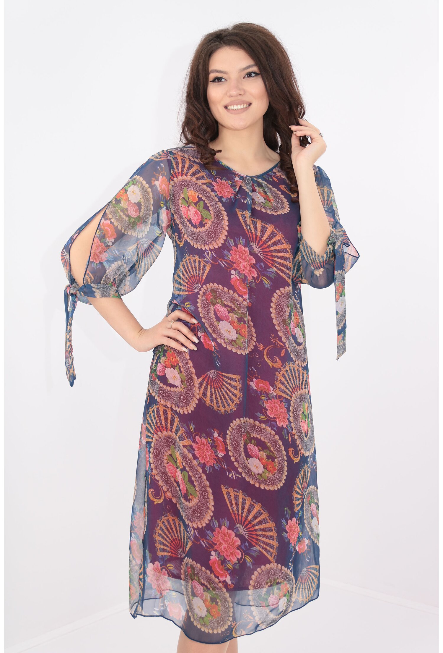 Rochie vaporoasa din voal albastru cu print floral